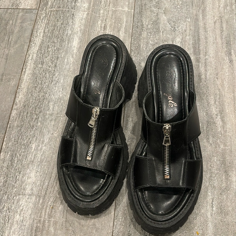 Free People black zip sandals